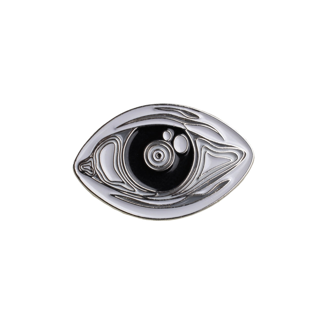 pin metálico ojo